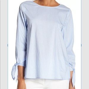 Gingham tie long sleeves high low top